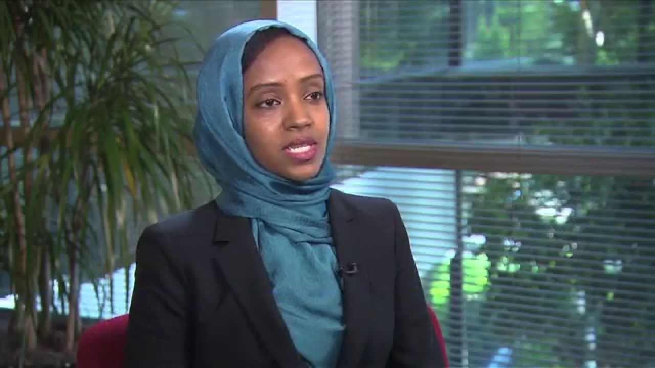 woman in hijab speaking